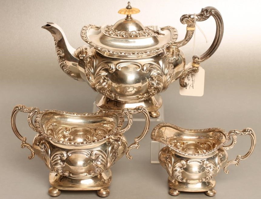 A LATE VICTORIAN SILVER THREE PIECE TEA SERVICE Image