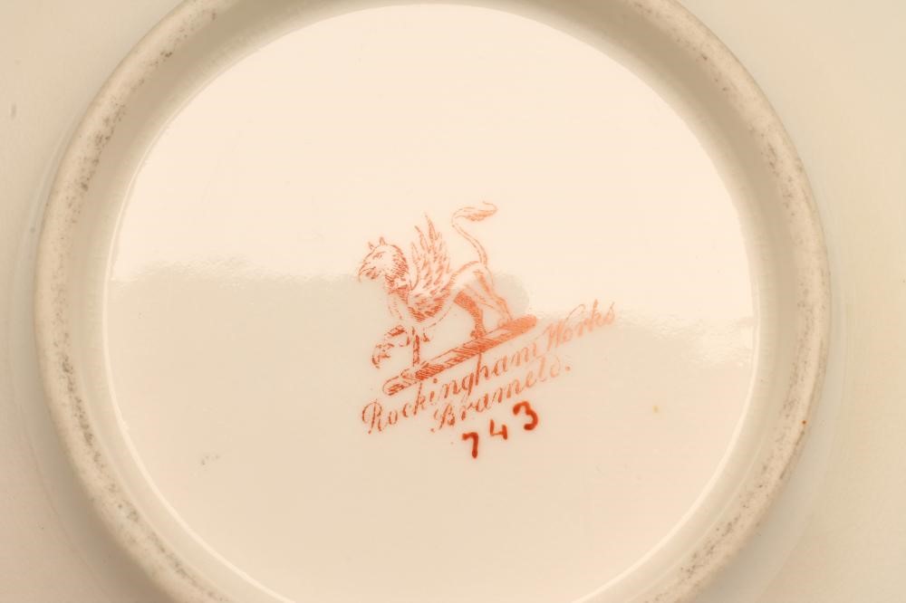 A ROCKINGHAM PORCELAIN CUP AND SAUCER Image