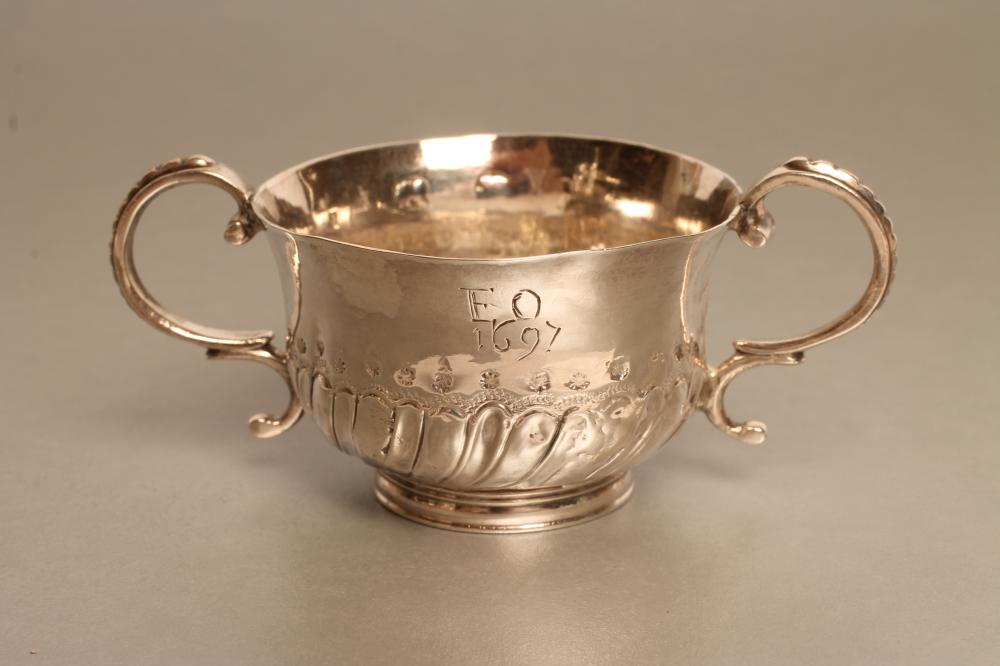 A WILLIAM III SILVER SMALL CAUDLE CUP Image