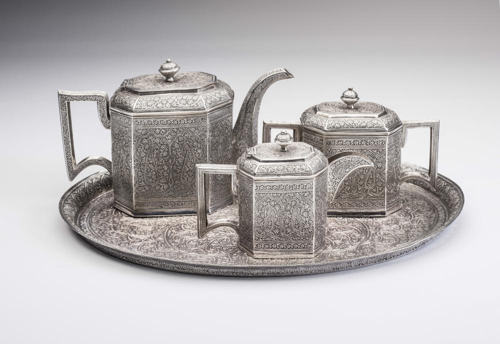 AN INDIAN WHITE METAL THREE PIECE TEA SERVICE Image