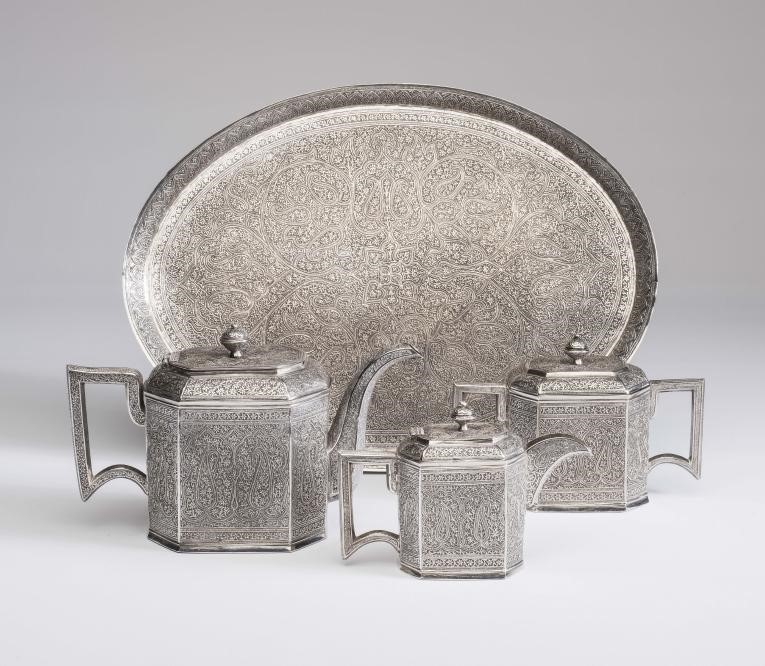 AN INDIAN WHITE METAL THREE PIECE TEA SERVICE Image
