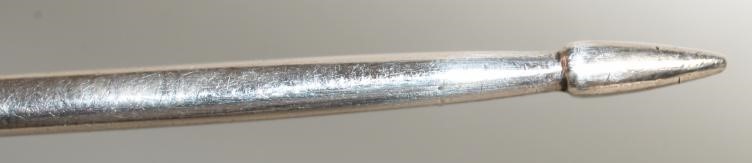 A LATE GEORGE III SILVER MOTE SPOON Image