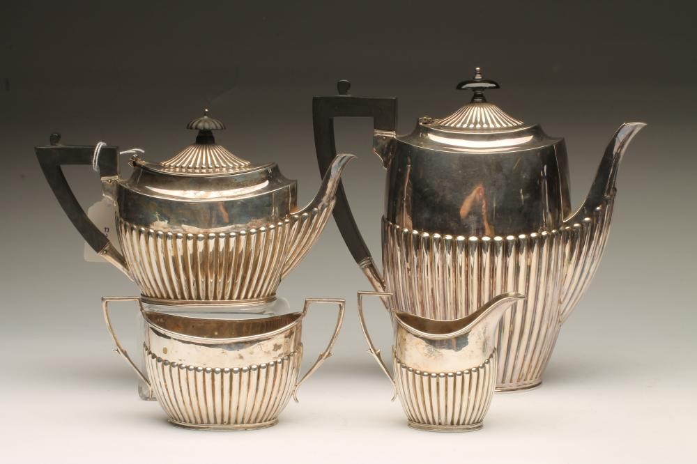 A LATE VICTORIAN SILVER COMPOSITE THREE PIECE TEA SERVICE Image