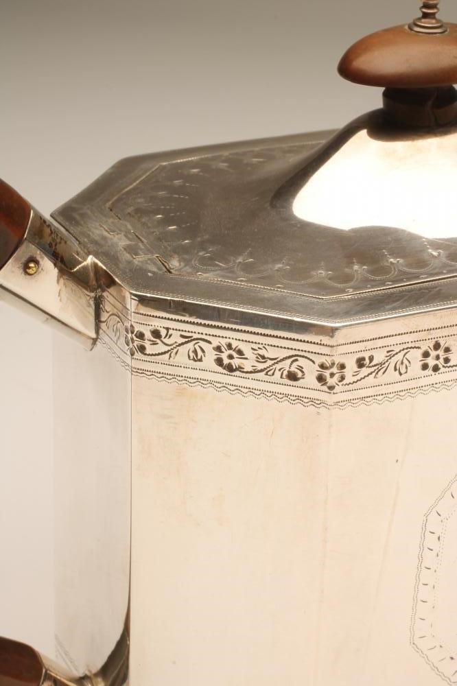 A LATE GEORGE III SILVER TEAPOT Image