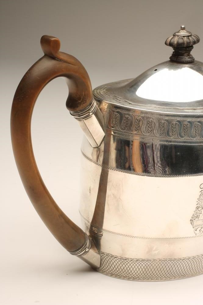 A LATE GEORGE III SILVER TEAPOT Image