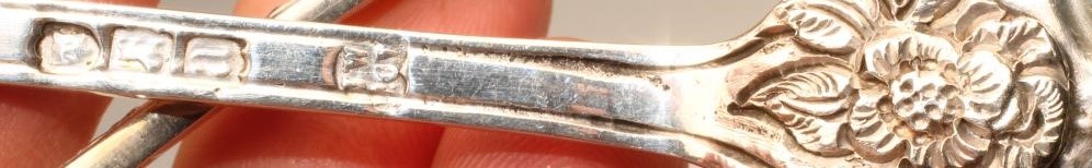 A PAIR OF LATE GEORGE III SILVER DESSERT SPOONS Image