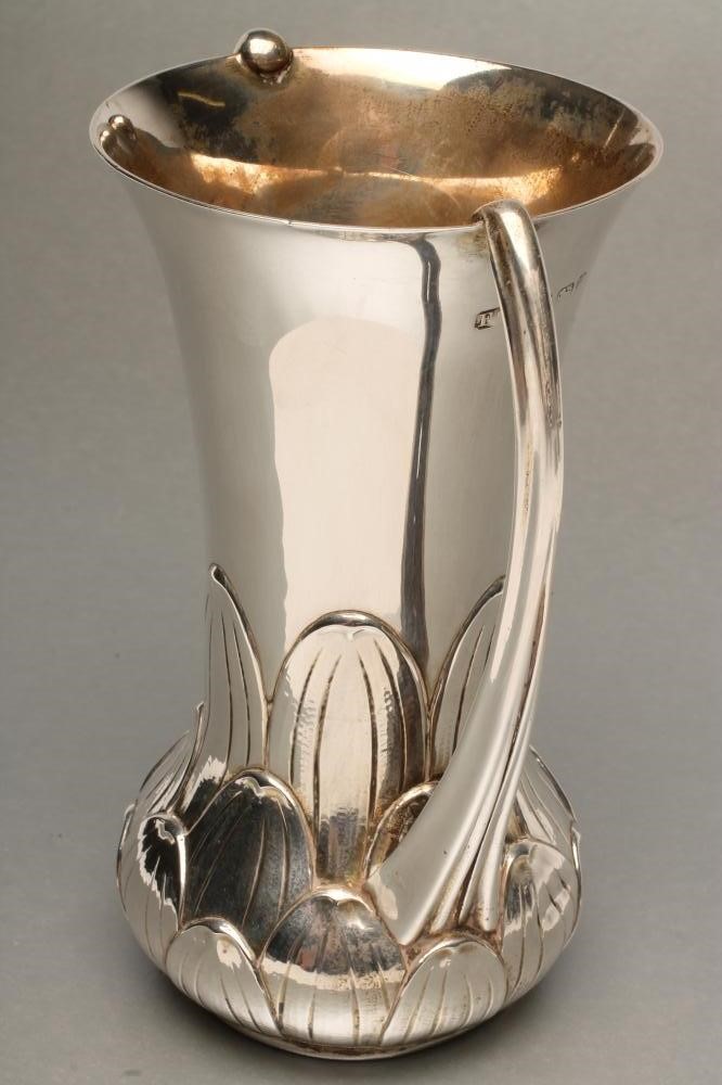 AN EDWARDIAN ARTS AND CRAFTS SILVER VASE Image