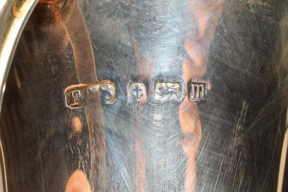 AN EDWARDIAN ARTS AND CRAFTS SILVER VASE Image