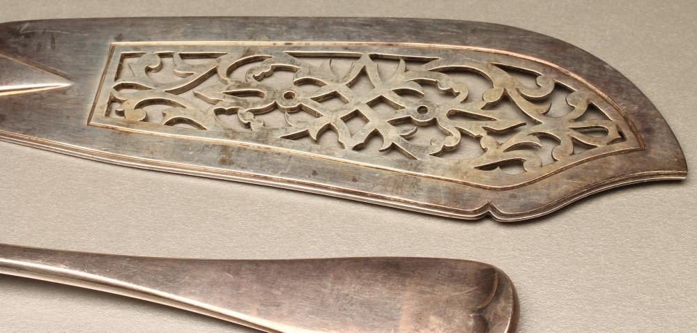 A PAIR OF EARLY VICTORIAN SILVER FISH SERVERS Image