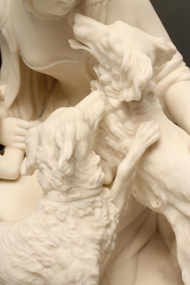 A VICTORIAN PARIAN FIGURE GROUP modelled as a young lady seated on a tree stump Image