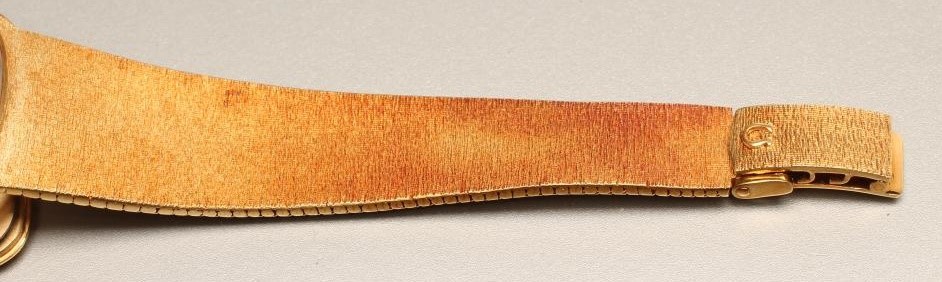 A LADY'S 18CT GOLD OMEGA DE VILLE WRISTWATCH Image