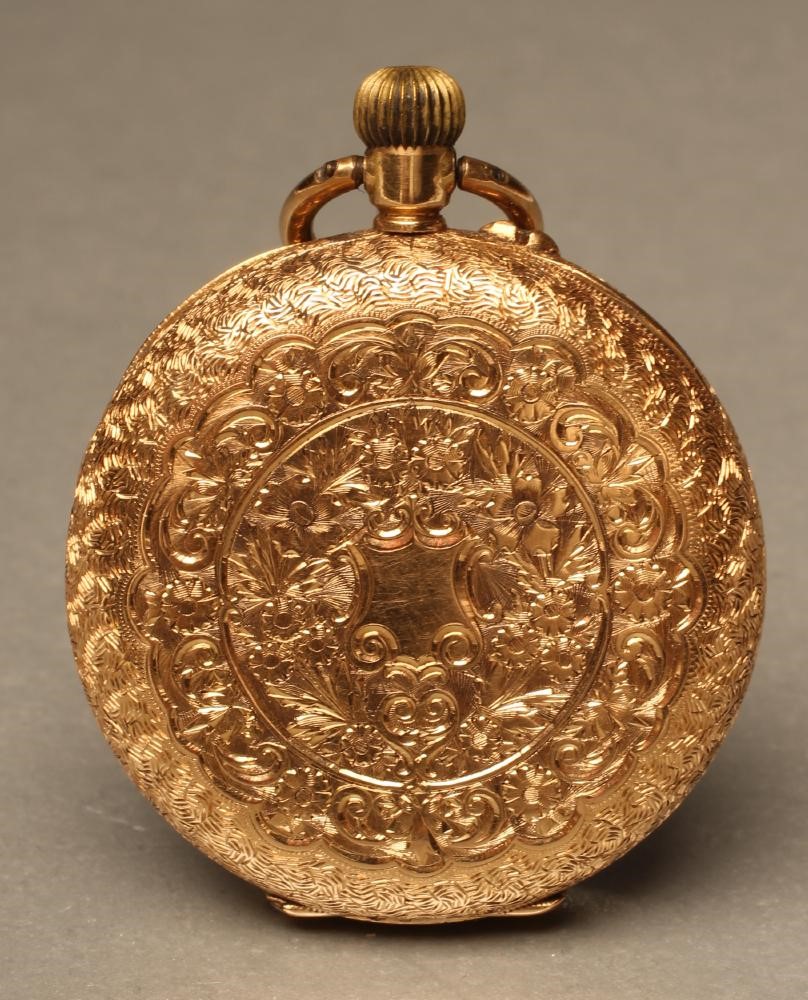 AN 18K GOLD SMALL TOP WIND POCKET WATCH Image