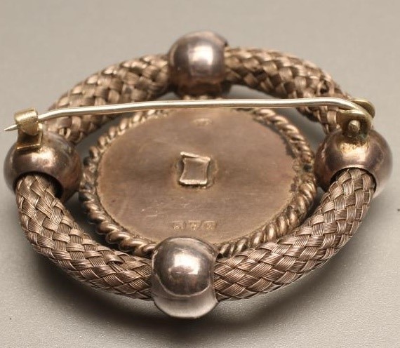 AN EDWARDIAN SILVER CELTIC STYLE BROOCH Image