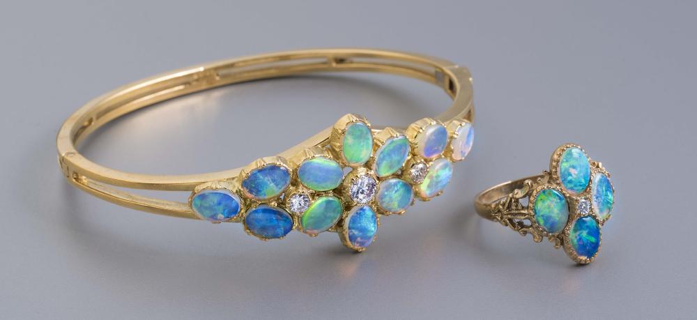 AN OPAL AND DIAMOND STIFF HINGED BANGLE Image