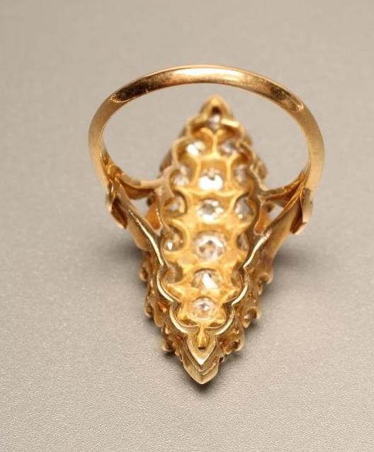 A DIAMOND MARQUISE PANEL RING Image