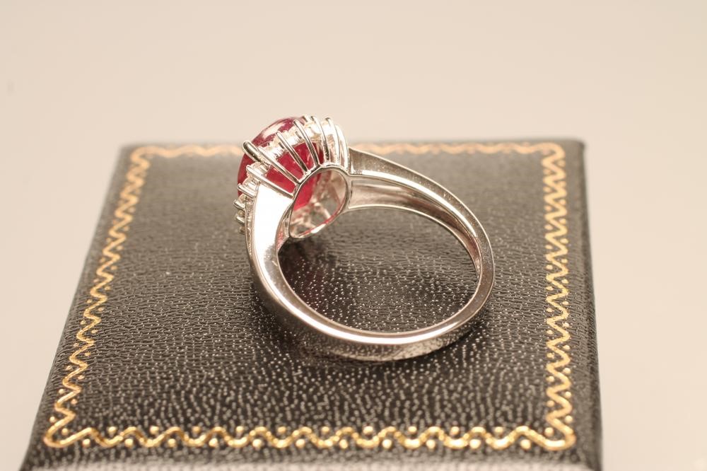 A RUBY AND DIAMOND DRESS RING Image