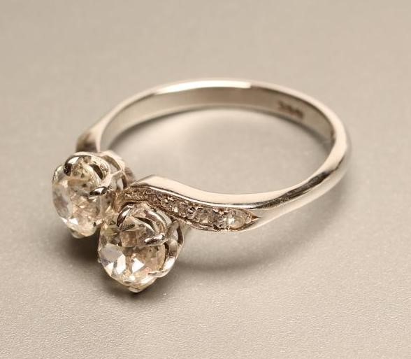 A TWO STONE DIAMOND CROSSOVER RING Image