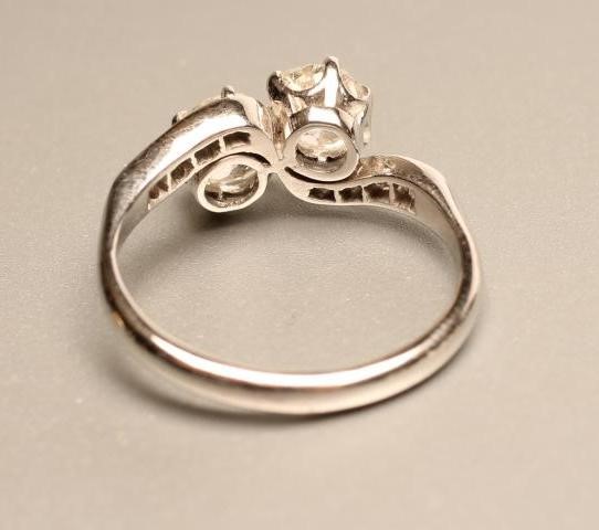 A TWO STONE DIAMOND CROSSOVER RING Image