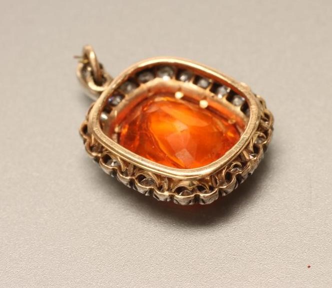 A FIRE OPAL AND DIAMOND PENDANT Image