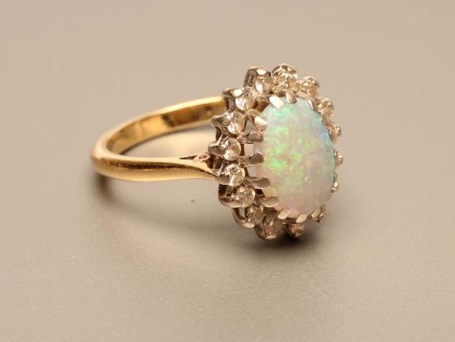 AN OPAL AND DIAMOND CLUSTER RING Image