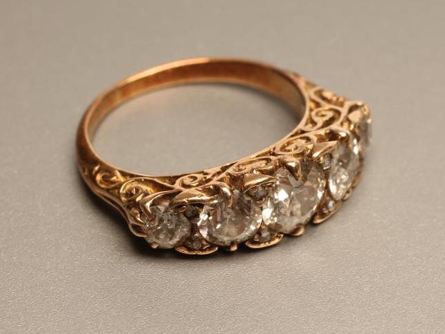 A FIVE STONE DIAMOND RING Image