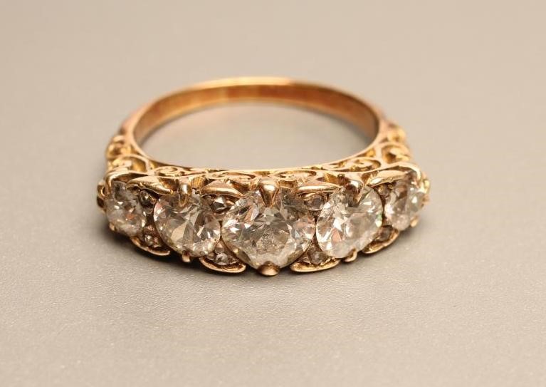 A FIVE STONE DIAMOND RING Image