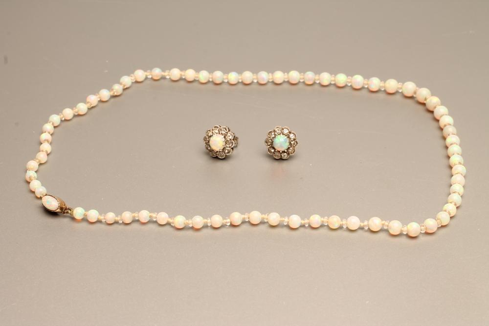 A PAIR OF OPAL AND DIAMOND EAR STUDS Image