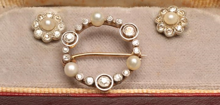 A PAIR OF PEARL AND DIAMOND EAR STUDS Image