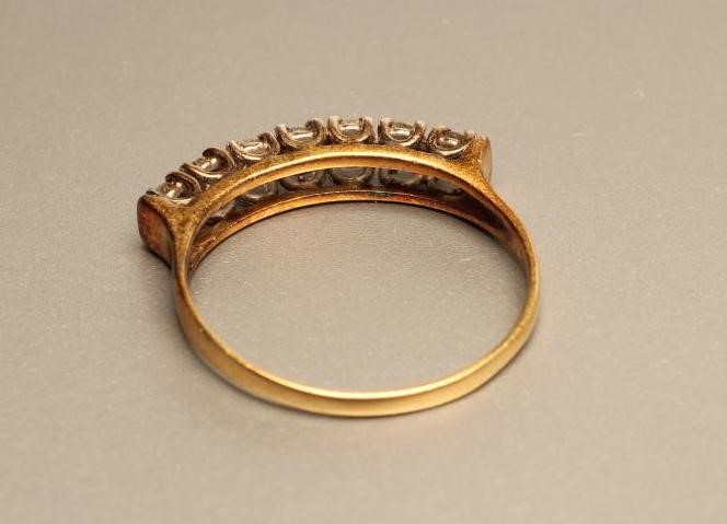 A SEVEN STONE DIAMOND HALF HOOP ETERNITY RING Image