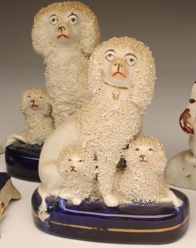 A PAIR OF VICTORIAN STAFFORDSHIRE POTTERY SPANIEL INKWELLS Image