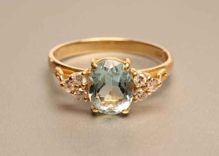 AN AQUAMARINE AND DIAMOND DRESS RING Image