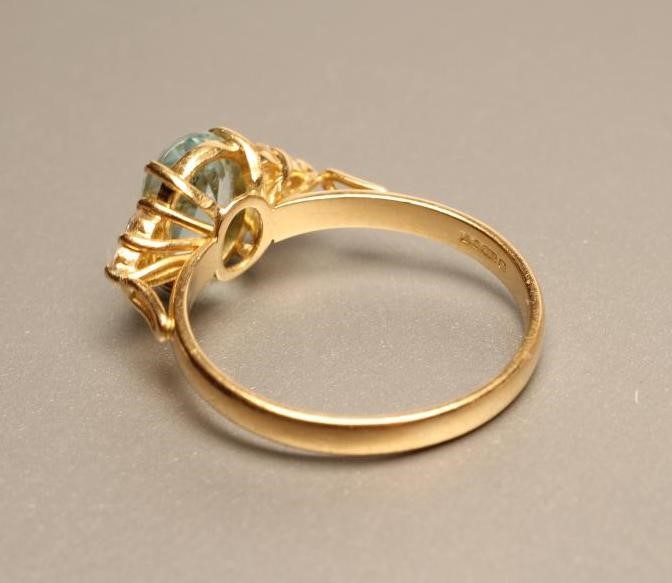 AN AQUAMARINE AND DIAMOND DRESS RING Image