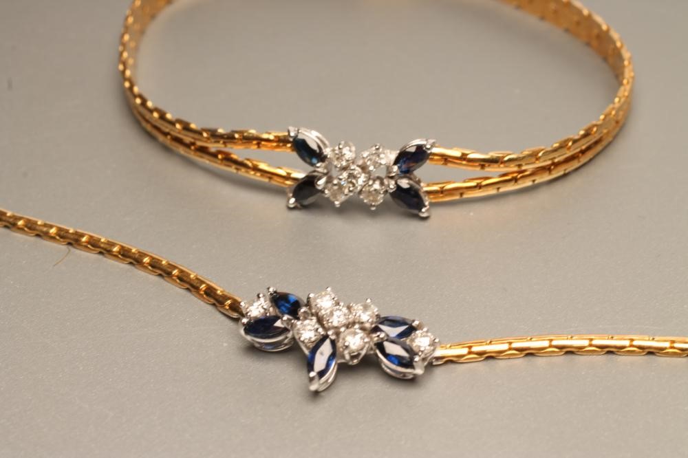 A DIAMOND AND SAPPHIRE NECKLACE WITH MATCHING BRACELET Image