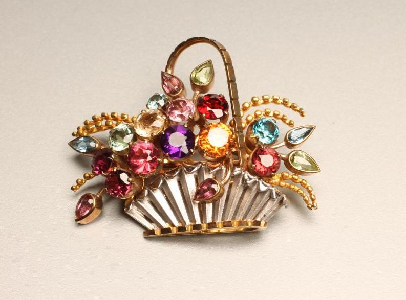 A MULTI-GEM SET BASKET BROOCH Image