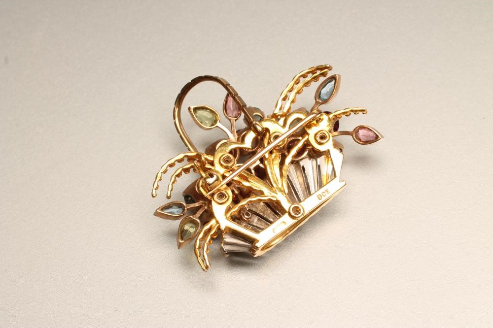 A MULTI-GEM SET BASKET BROOCH Image