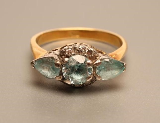 A THREE STONE BLUE ZIRCON RING Image
