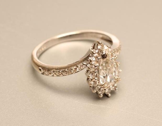 A DIAMOND CLUSTER RING Image