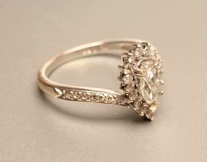 A DIAMOND CLUSTER RING Image