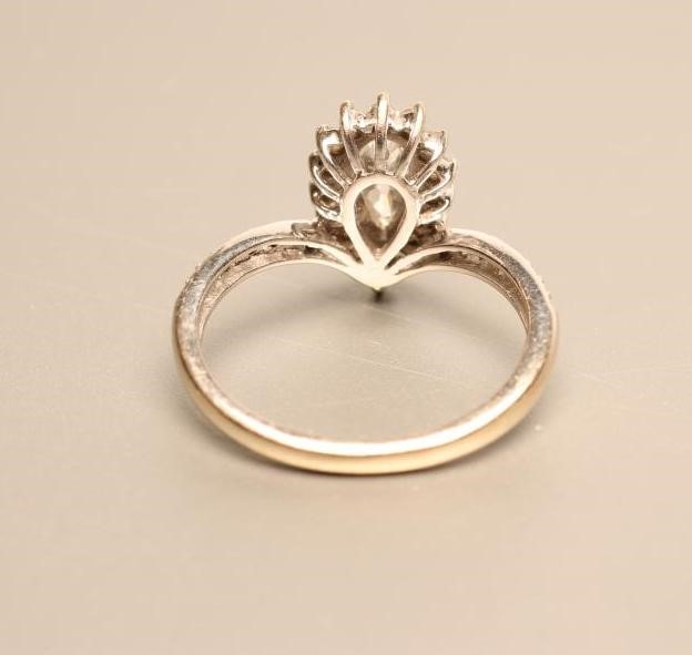 A DIAMOND CLUSTER RING Image