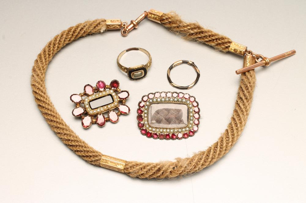 A COLLECTION OF EARLY VICTORIAN MOURNING JEWELLERY Image