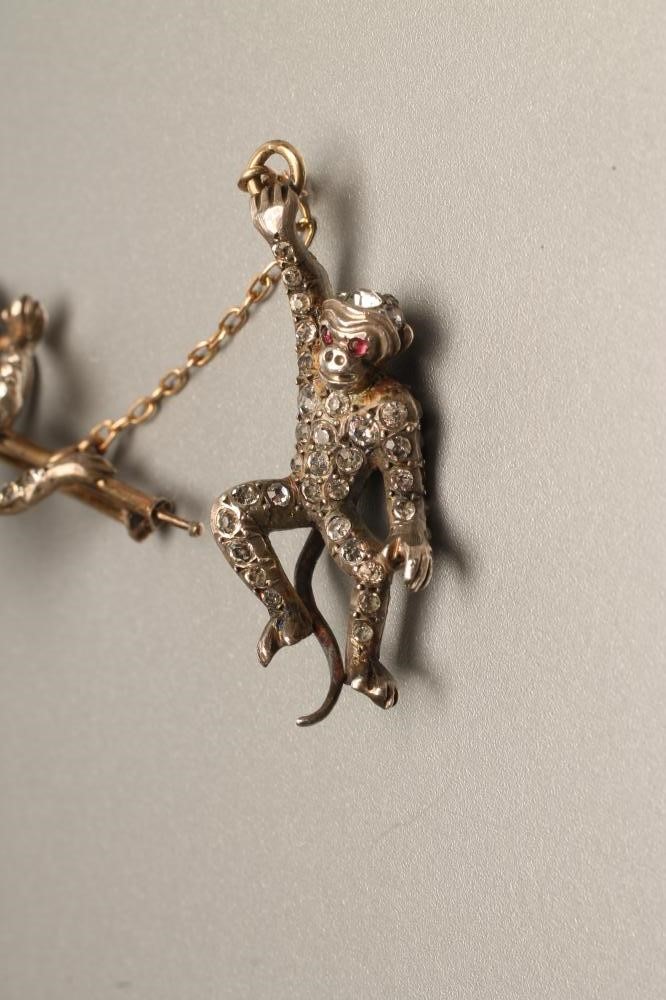 AN ART DECO CONTINENTAL SILVER DOUBLE BAR BROOCH channel set with square cut coloured paste Image