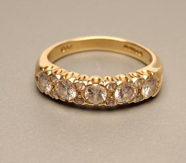 A FIVE STONE DIAMOND HALF HOOP ETERNITY RING Image