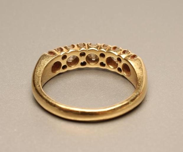 A FIVE STONE DIAMOND HALF HOOP ETERNITY RING Image