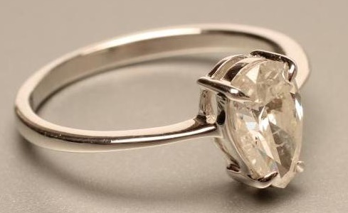 A SOLITAIRE DIAMOND RING Image