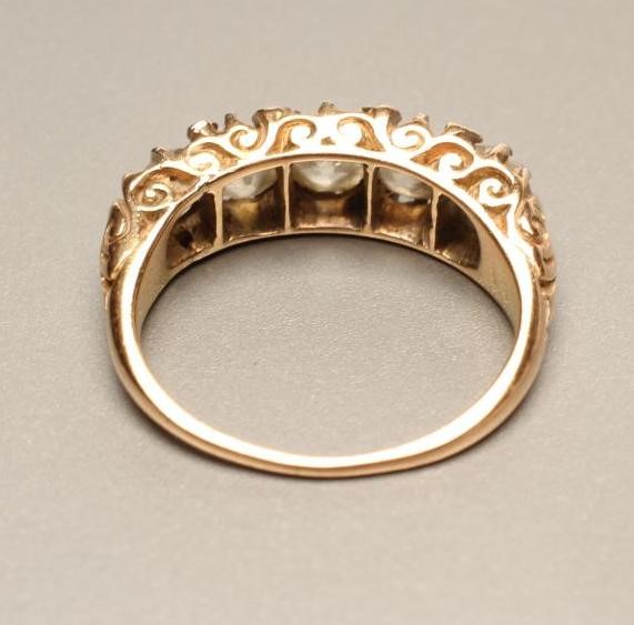 A FIVE STONE DIAMOND RING Image
