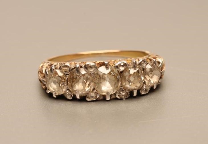 A FIVE STONE DIAMOND RING Image