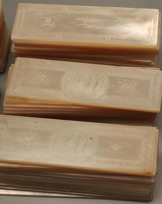 A COLLECTION OF CANTONESE MOTHER OF PEARL GAMING COUNTERS Image