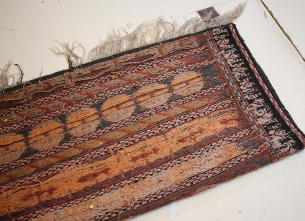 AN AFGHAN FLATWEAVE RUG Image