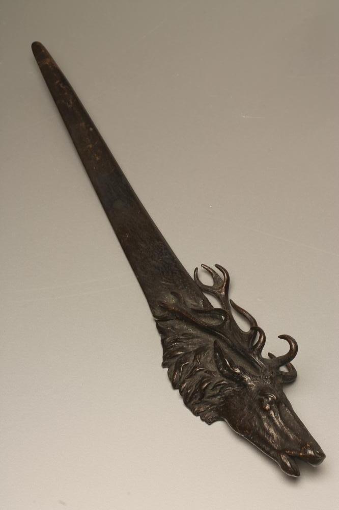 A BRONZE PAPER KNIFE Image