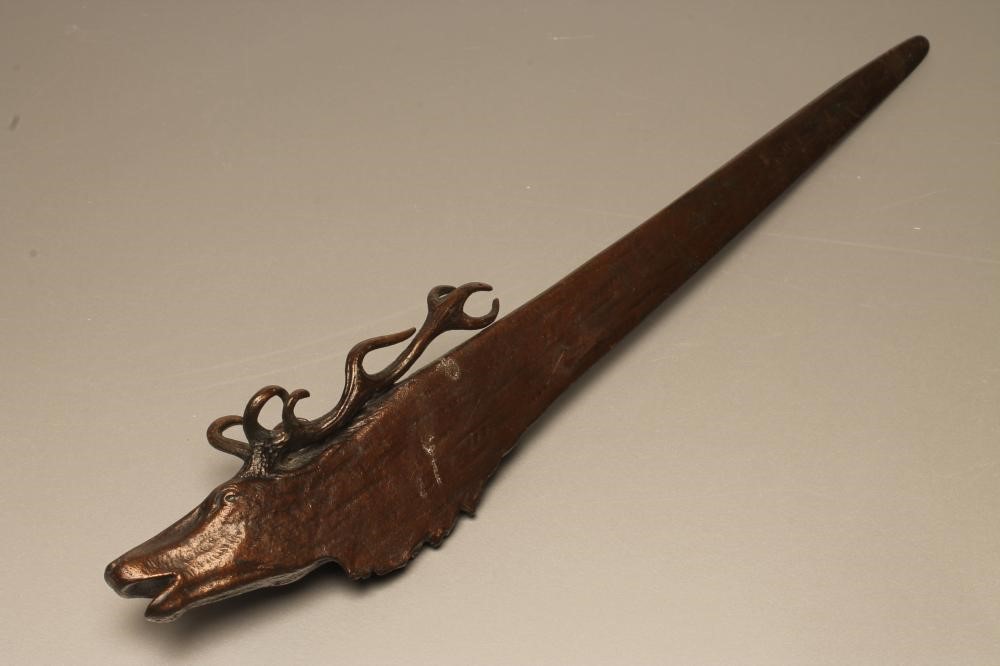 A BRONZE PAPER KNIFE Image